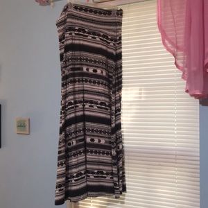 Floor length black and white skirt.